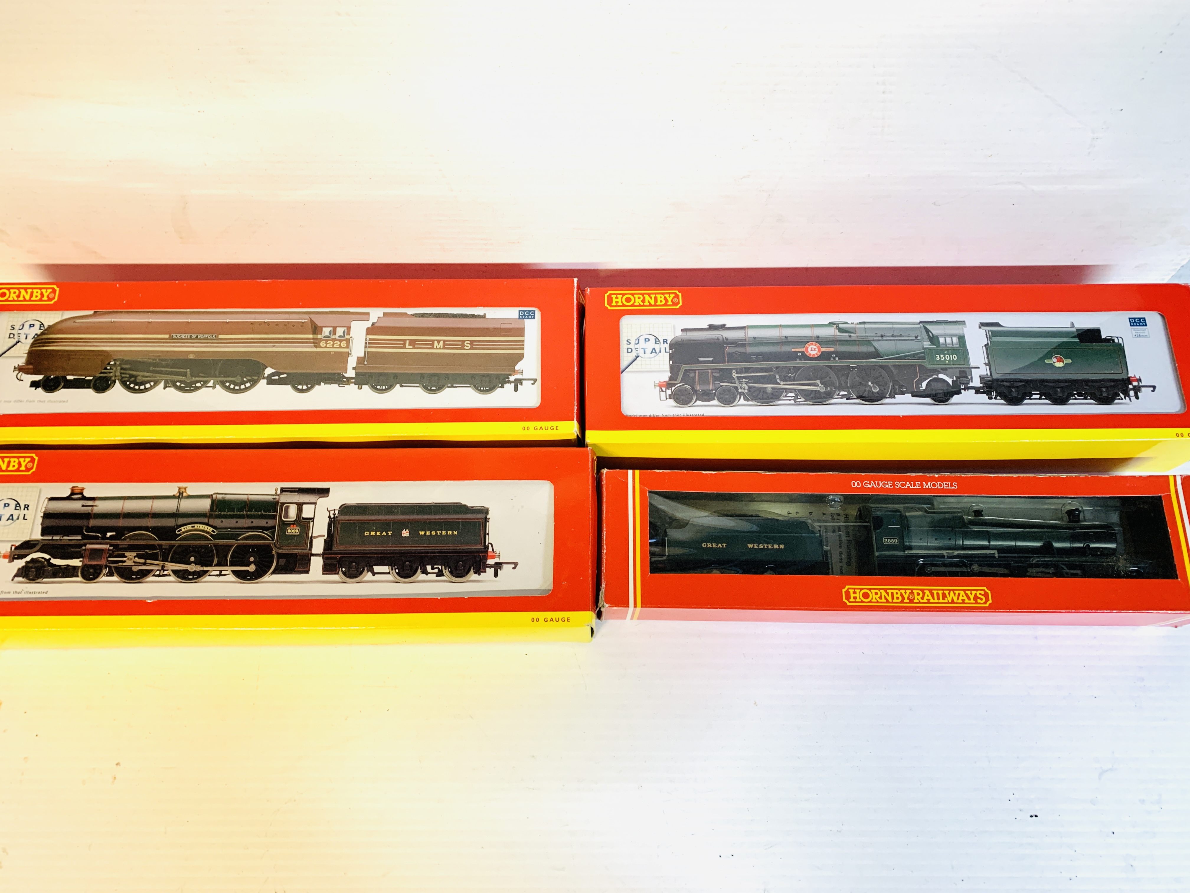 Four Hornby boxed locomotives.