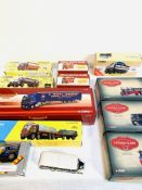 A collection of diecast lorries and buses, boxed