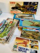 Eleven boxed plastic aeroplane model kits including Airfix and Revell.