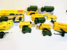 Nine Dinky Toys diecast model military vehicles, all boxed.