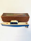 A Hornby tinplate clockwork speedboat