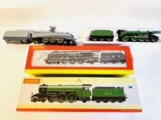 Four Hornby boxed locomotives.