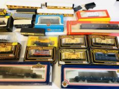 Twenty-two various OO gauge coaches and wagons.