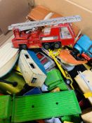 Box containing a collection of various diecast toys including Corgi and Matchbox.