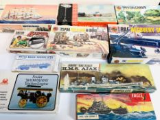 Ten boxed plastic model kits