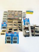 A quantity of miniature model railway wagons