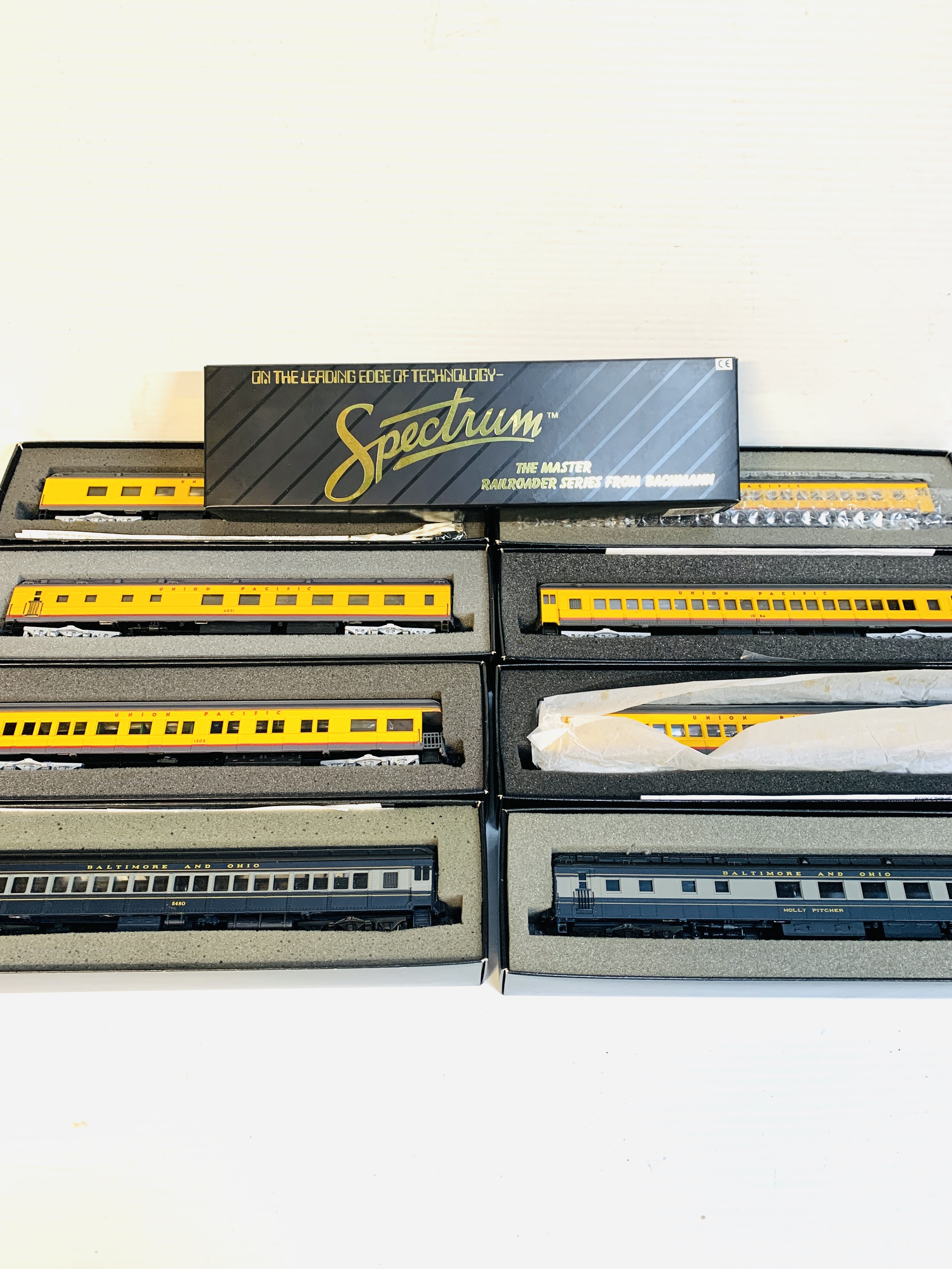 Eight boxed Spectrum railway carriages