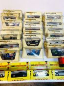 Nineteen boxed Matchbox Models of Yesteryear, including delivery vans and cars
