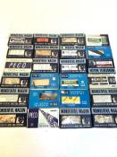 Twenty-four boxed Peco 'OO' gauge wagons.