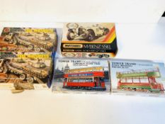 Two Airfix model tank transporters; model Matchbox Mercedes-Benz SSKL; and two model trams.