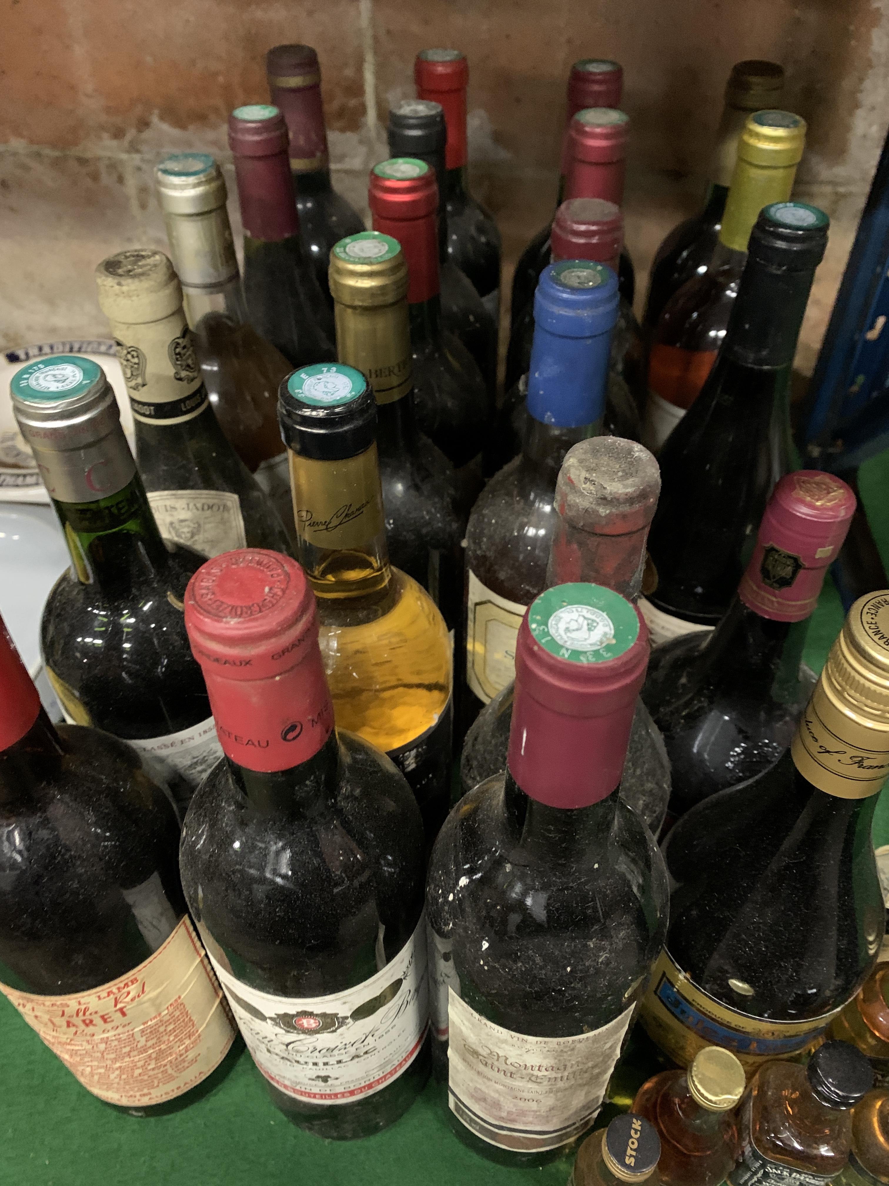 23 bottles of assorted French wines including Bordeaux.