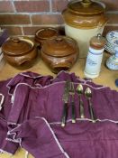 Four stoneware pots and a quantity of cutlery