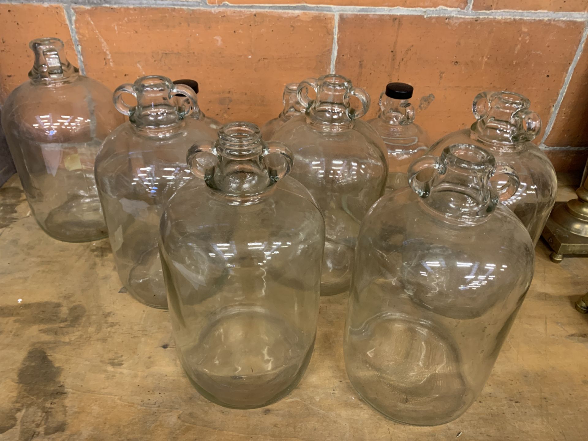 Six small demijohns