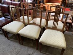 Six oak dining chairs