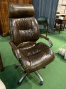 Chrome and brown leather upholstered swivel office armchair