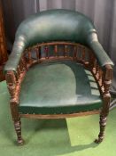 Green leather effect club chair