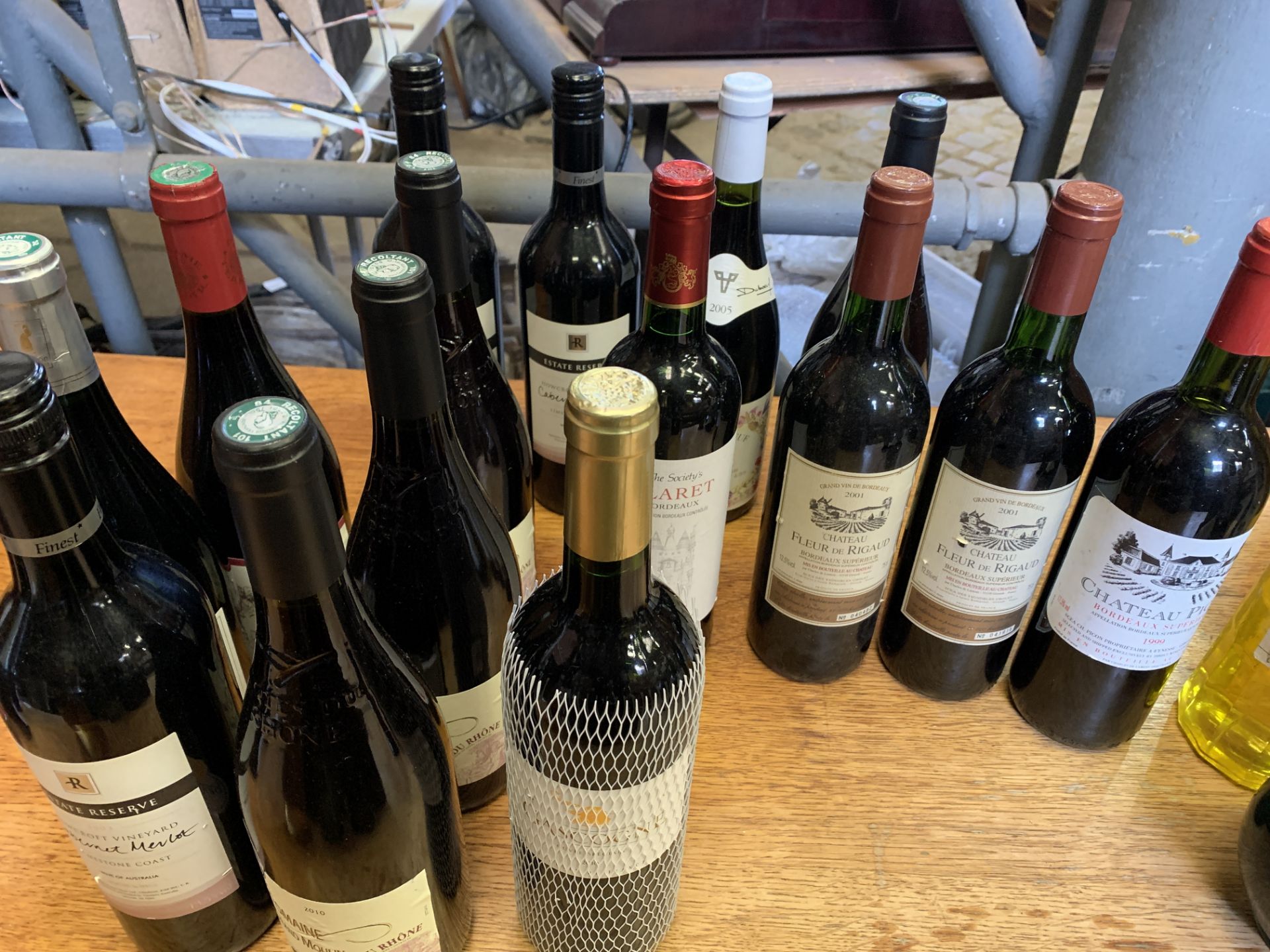 Fifteen bottles of various red wine