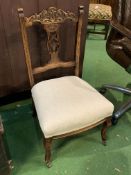 Carved mahogany nursing chair