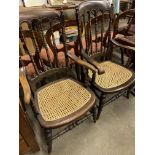 Two cane seat open armchairs