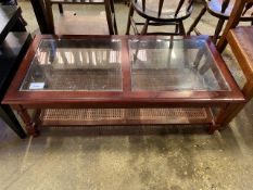 Mahogany framed bevelled edge glass top coffee table