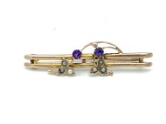 Four 9ct gold gem set bar brooches