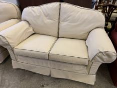 Cream two seat sofa