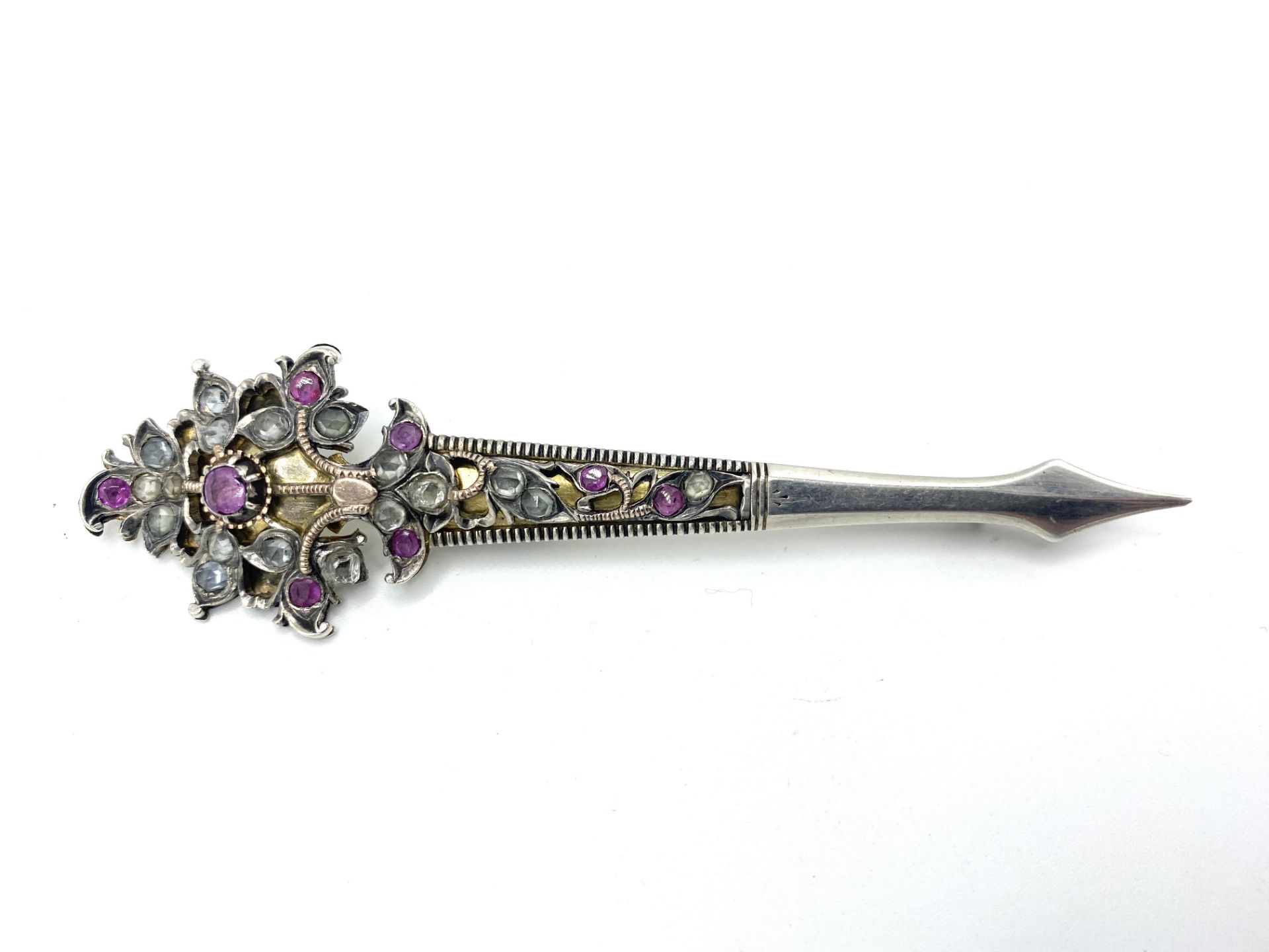 Silver turban pin/brooch set with white sapphires and rubies