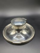 A large silver capstan shaped inkwell by A & J Zimmerman Ltd