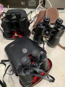 Four pairs of binoculars including Hoyer and Jaguar