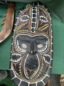Collection of wooden tribal Papua New Guinea carved artefacts