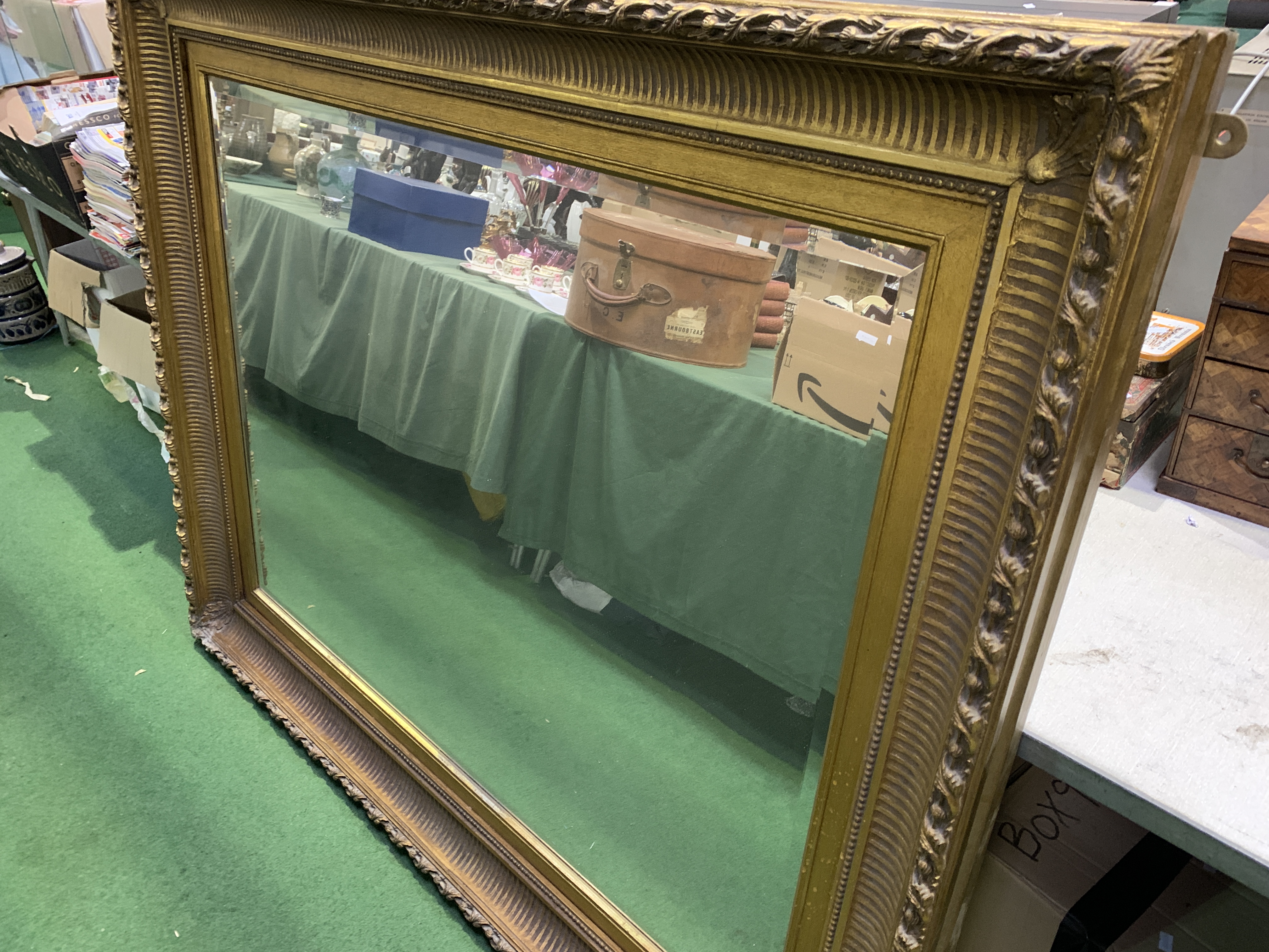 Gilt framed bevel edged mirror