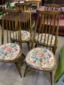 Four Ercol rail back chairs