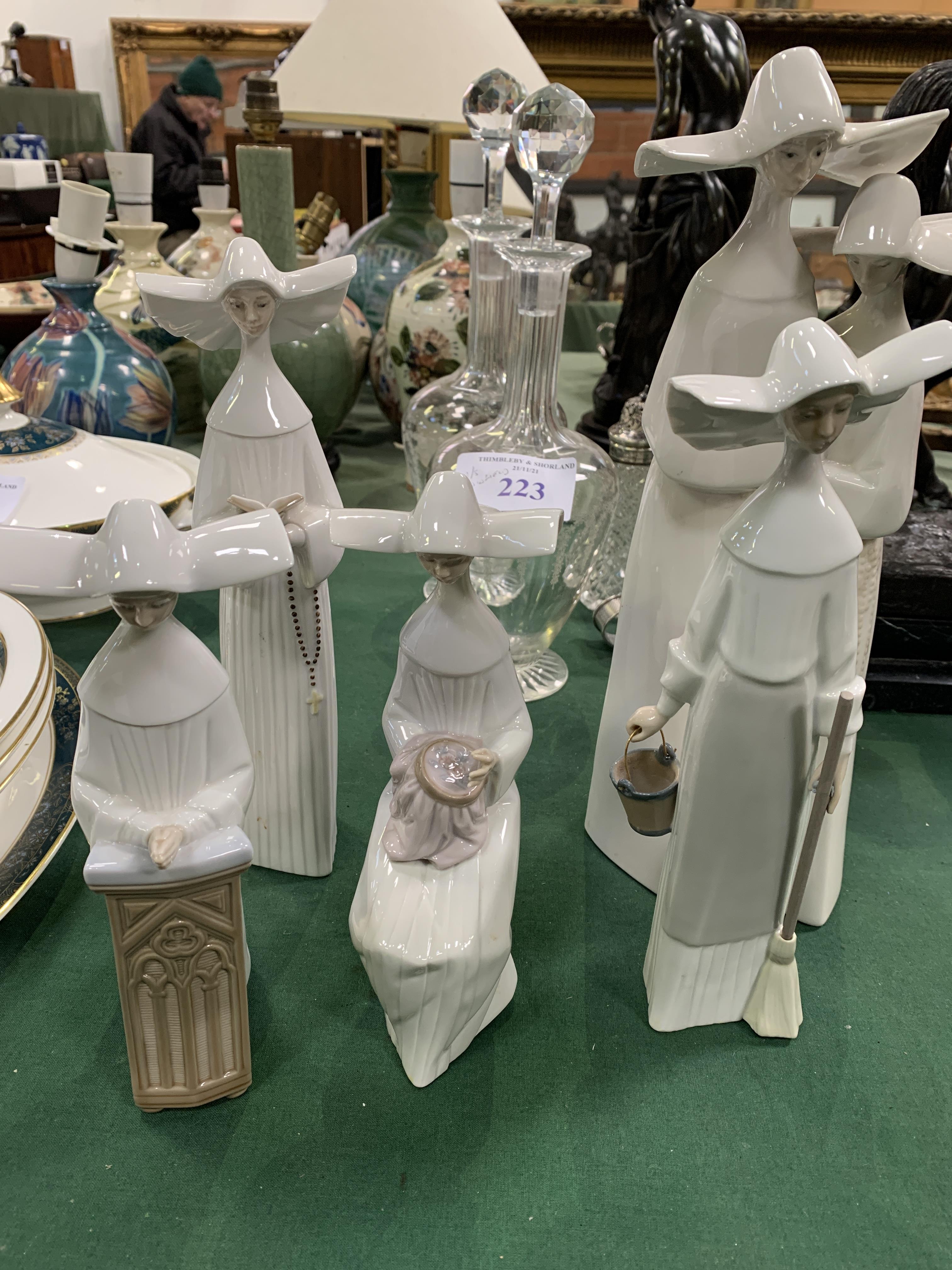 Five Lladro figurines of nuns