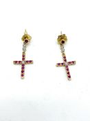 A pair of 18ct gold, diamond and ruby cross shape drop earrings