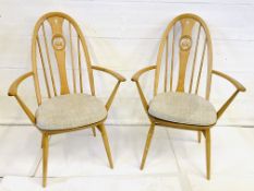 Pair of Ercol open armchairs