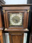 Oak longcase clock with brass face engraved James Yardley