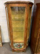 Bow fronted display cabinet