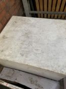 A rectangular block of calacatta marble