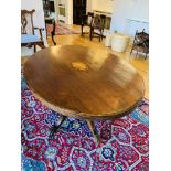 Oval mahogany tilt top table