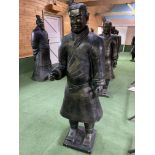 A Qin style terracotta figure of a standing soldier