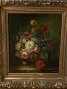 Heavy ornate gilt framed oil on canvas of still life flowers in vase, signed Cornelius