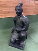 A Qin style terracotta figure of a kneeling archer