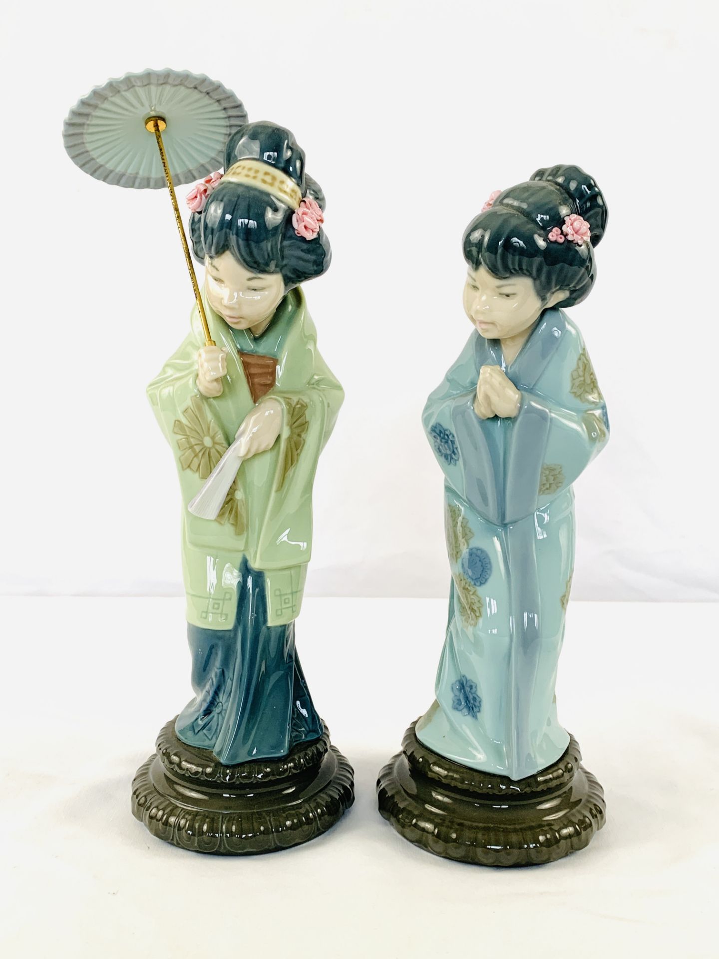Two Lladro figures of Japanese ladies