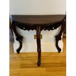 Carved wood console table
