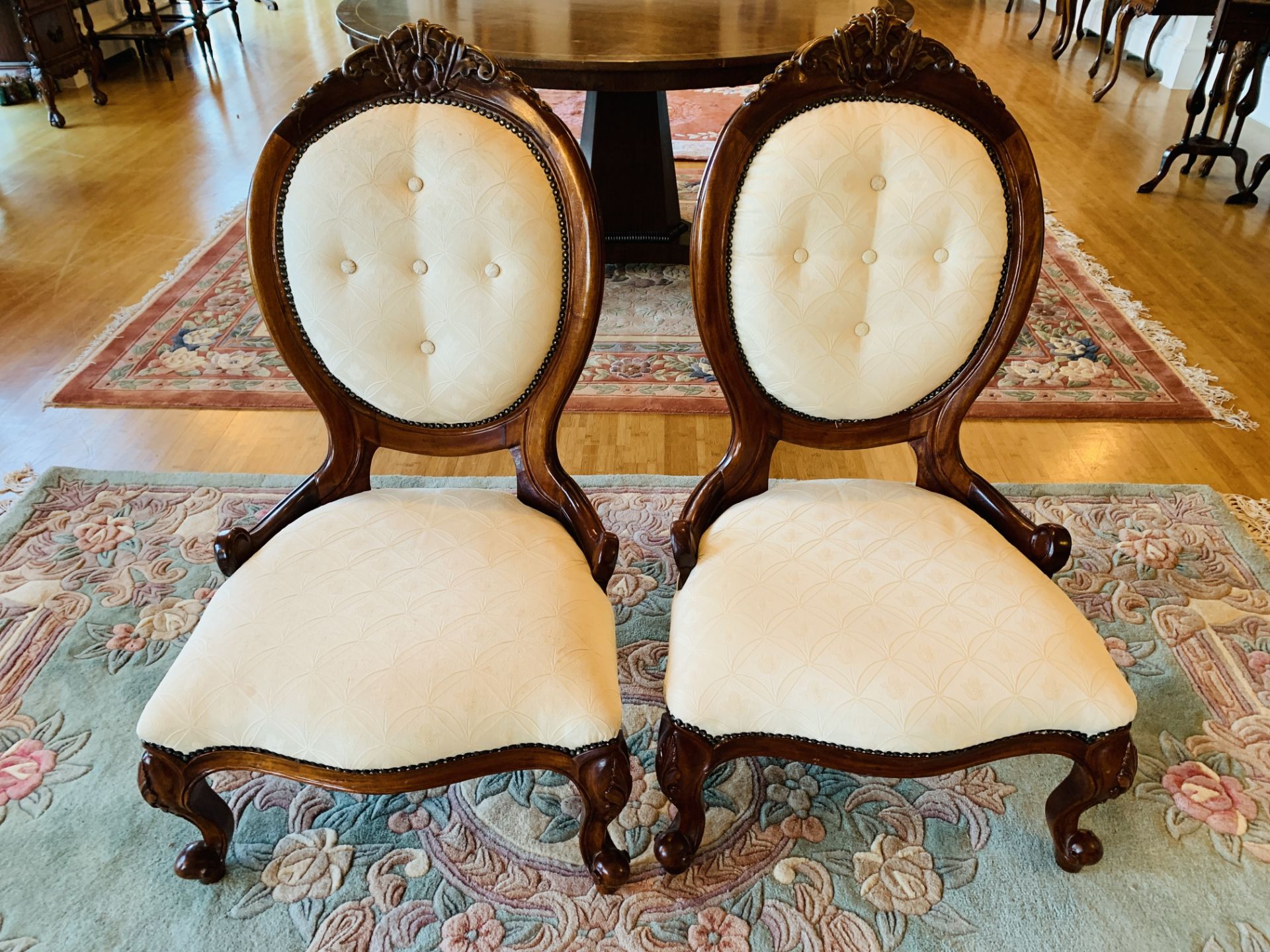 A pair of spoon back bedroom chairs