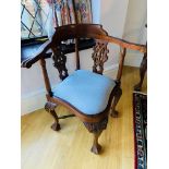 Pair of carved hardwood corner chairs