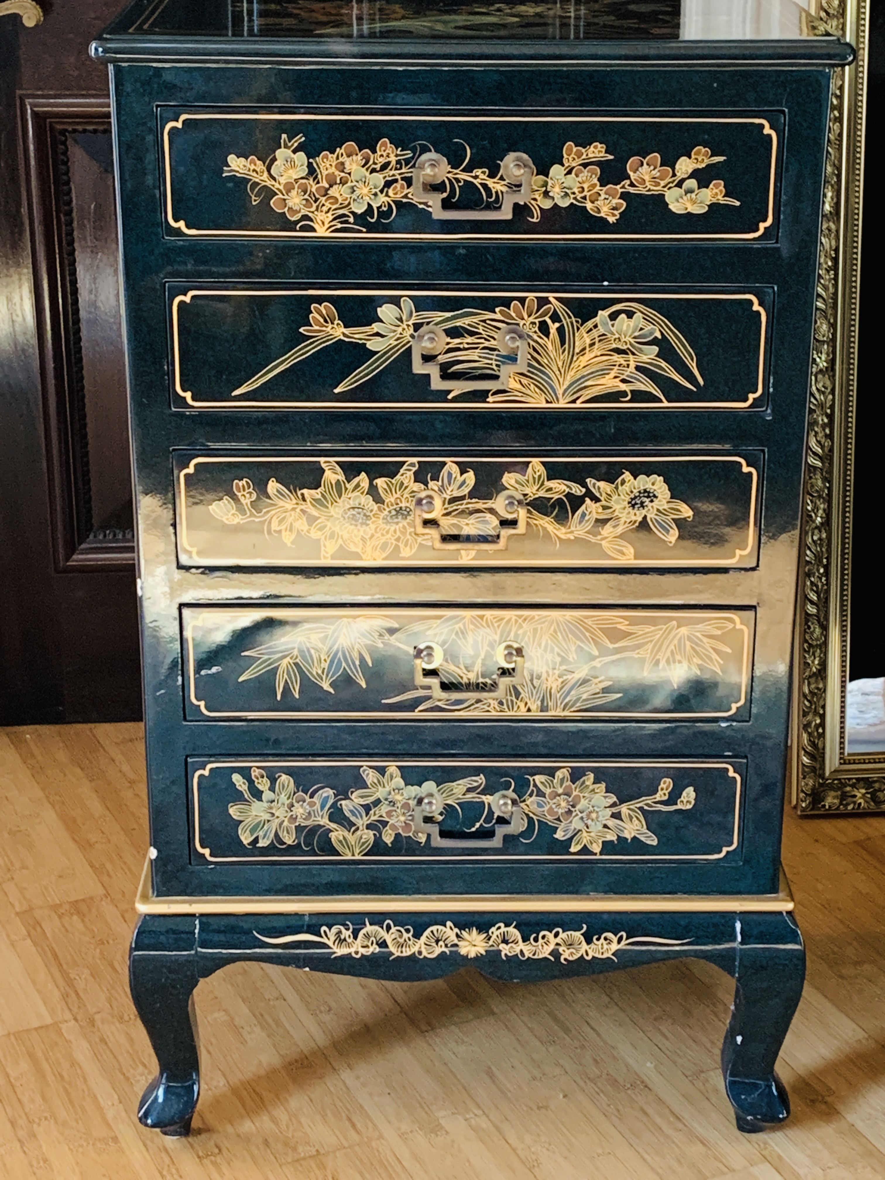 Oriental black lacquered chest of drawers