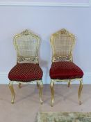 Pair of gilt framed hall chairs