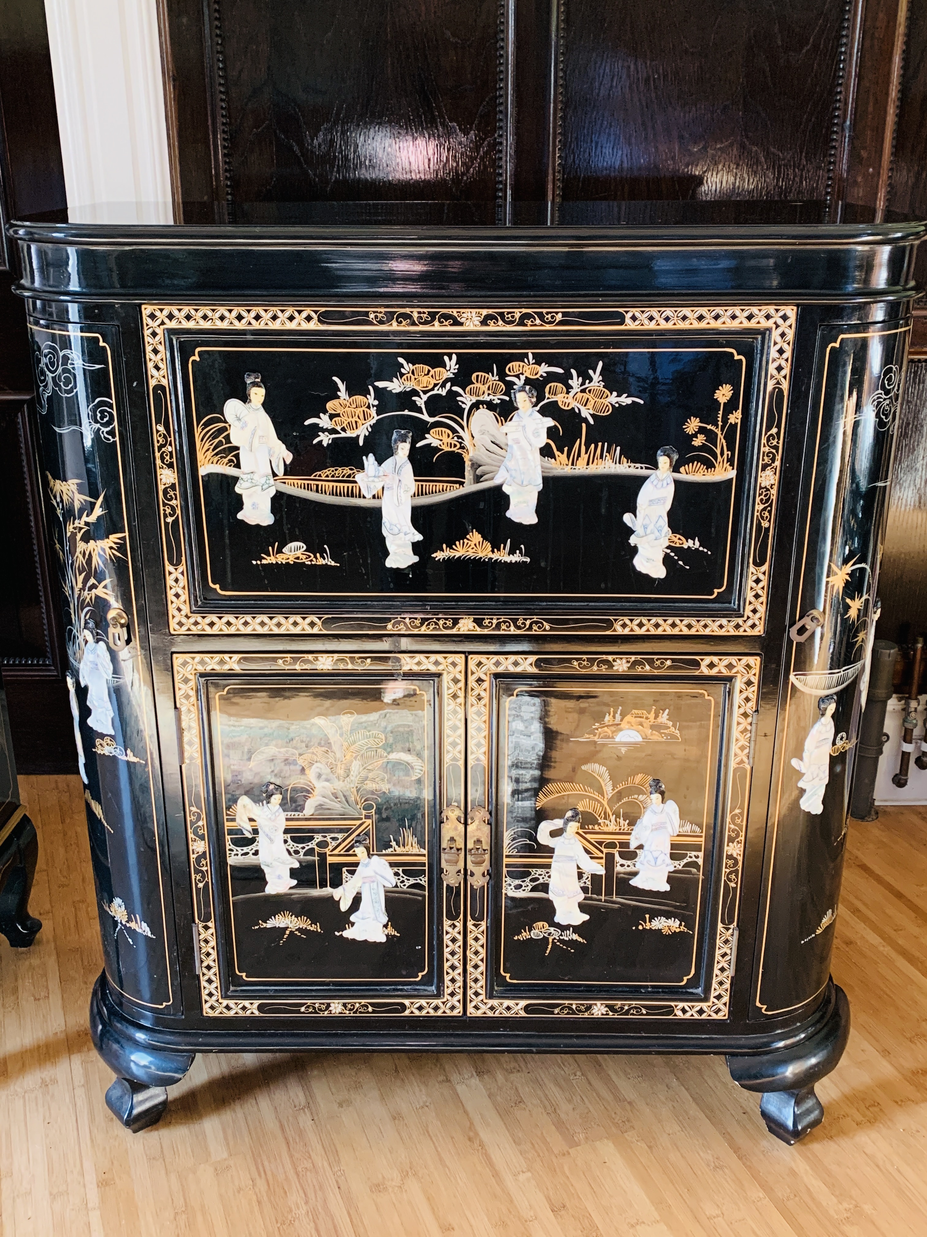 Oriental black lacquered cocktail cabinet