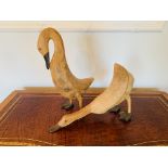 Two carved wooden ducks